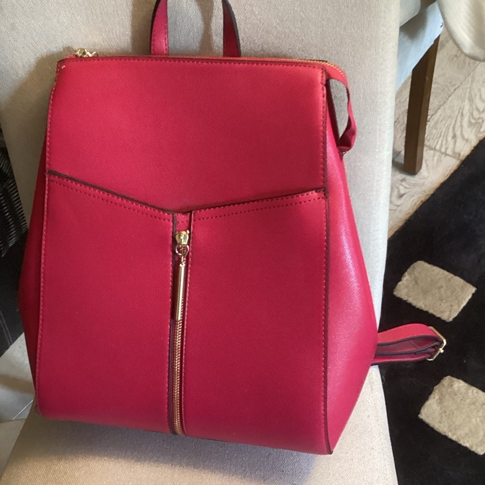 Neiman Marcus Vibrant magenta leather backpack